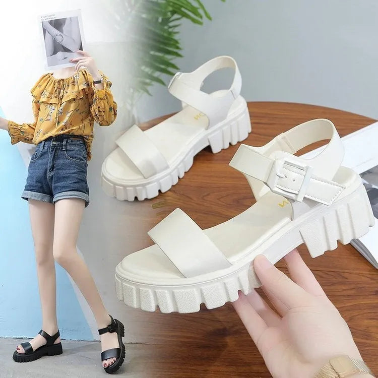 Women's beige platform sandals with peep toe and ankle-strap buckle on white background