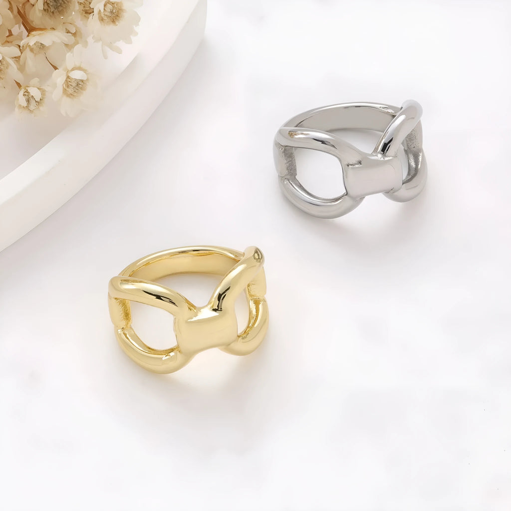 Women's titanium steel ring with butterfly geometric design and hollow bow construction in gold colour