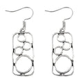 Geometric round ring earrings with irregular square design in antique silver colour
