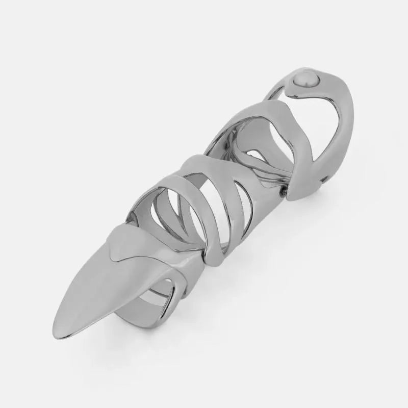 Silver punk armour finger stall with large geometric cutout on a model's finger.