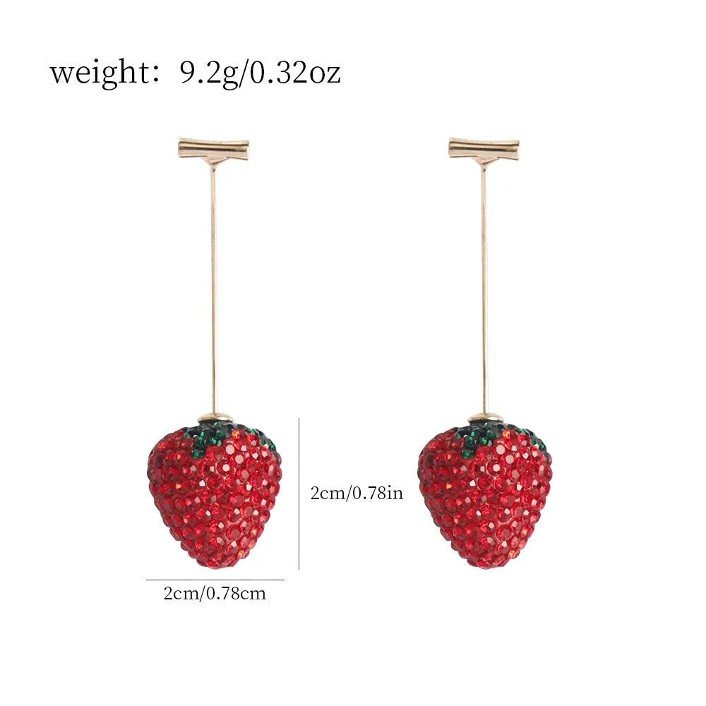 Geometric strawberry-shaped zinc alloy earrings with spot-drill texture, shown in red, on a white background.