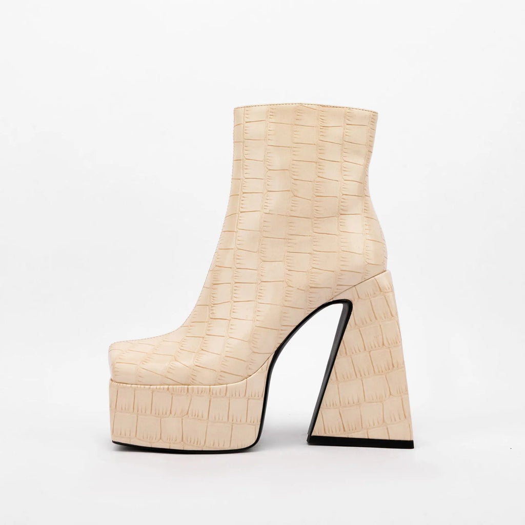 Women's solid colour ankle boot with a super high heel, shown in an available colour option.