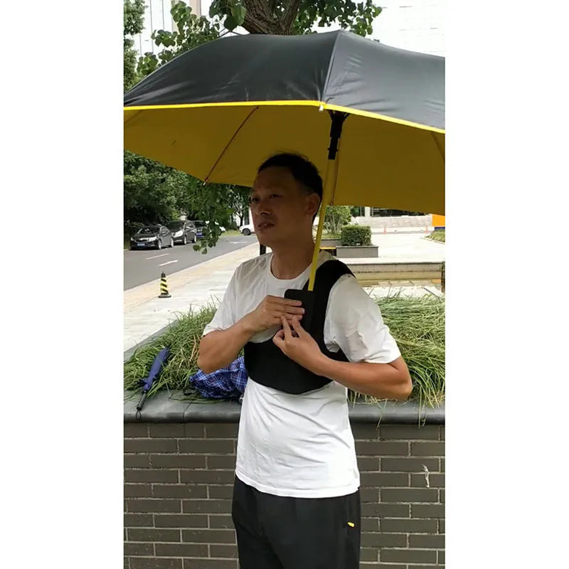 Black diving cloth umbrella holder with shoulder strap shown holding a manual umbrella.