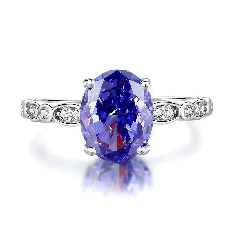 Heart-shaped sterling silver ring with a diamond ice flower cut Tan Sang colour zircon stone.