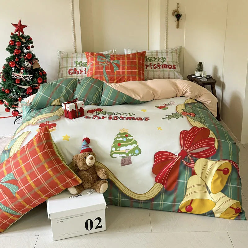 Christmas cartoon printed duvet cover and pillowcase set on a bed, showing Gingerbread Man or Tinker Bell design.