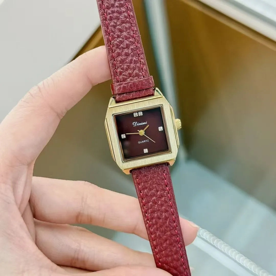 Chinese style red alloy women's wristwatch with a decorative dial on a 8mm thick case.
