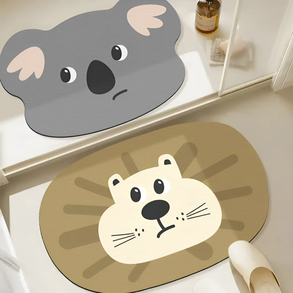 Cartoon animal diatom absorbent bathroom mat in bear pattern on tiled floor.