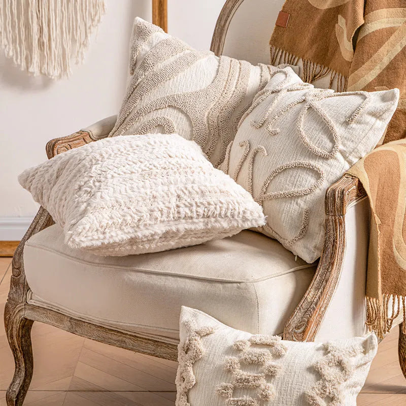 Knitted decorative cushion cover with tassel fringe in spiral dots pattern showing 45x45cm size