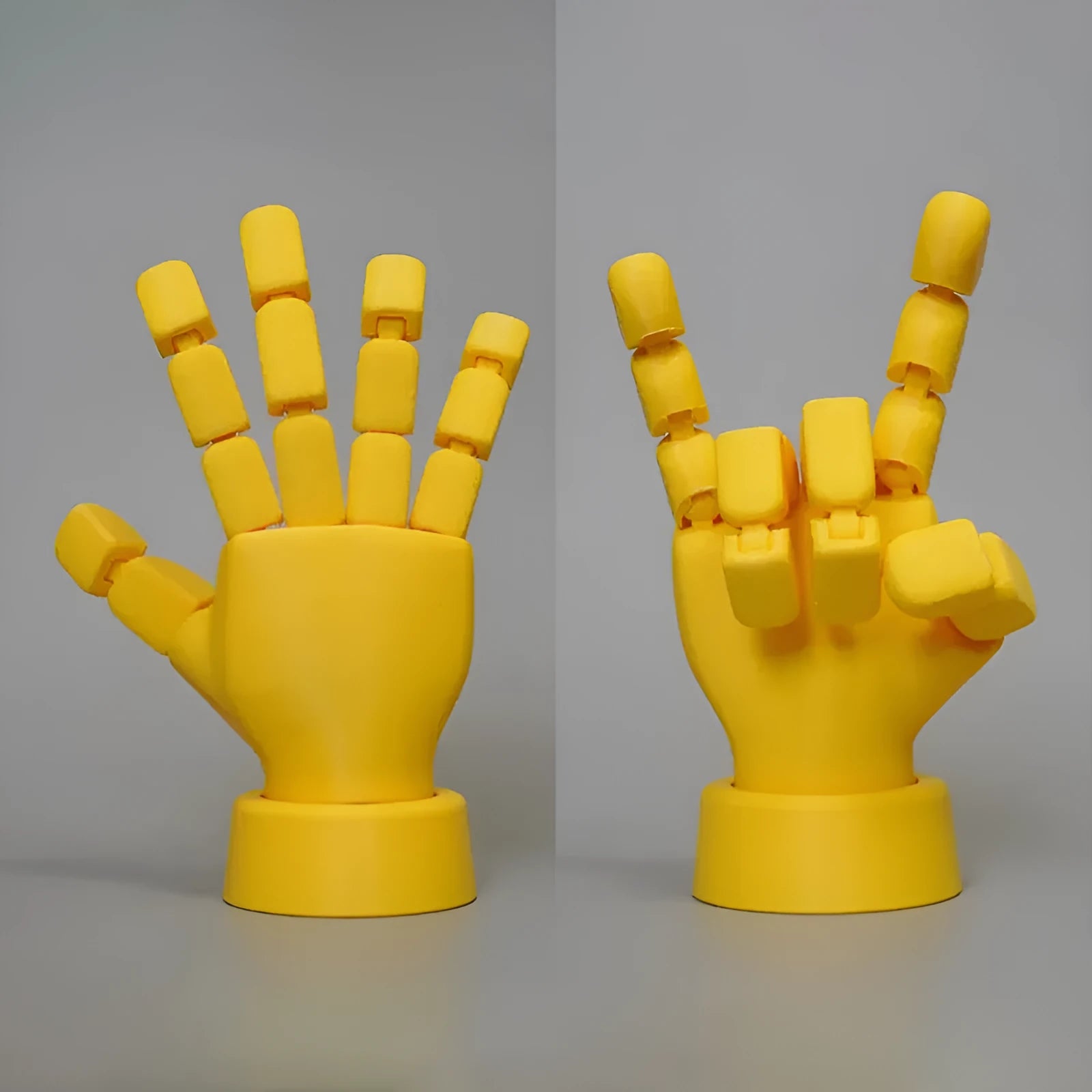 Yellow movable joint hand ornament figurine made of PLA plastic on a plain background