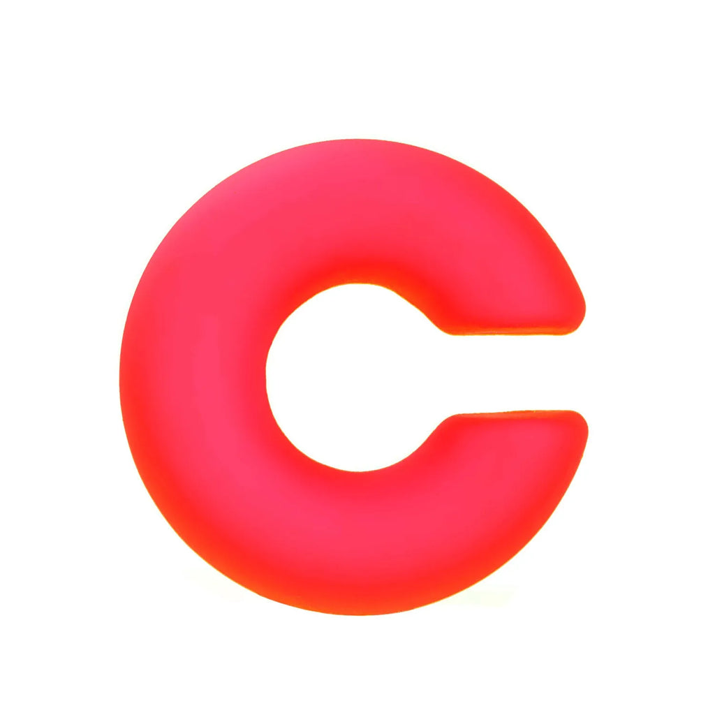 Close-up of matte finish, coarse round C-shaped clip-on earrings for women in a candy colour.
