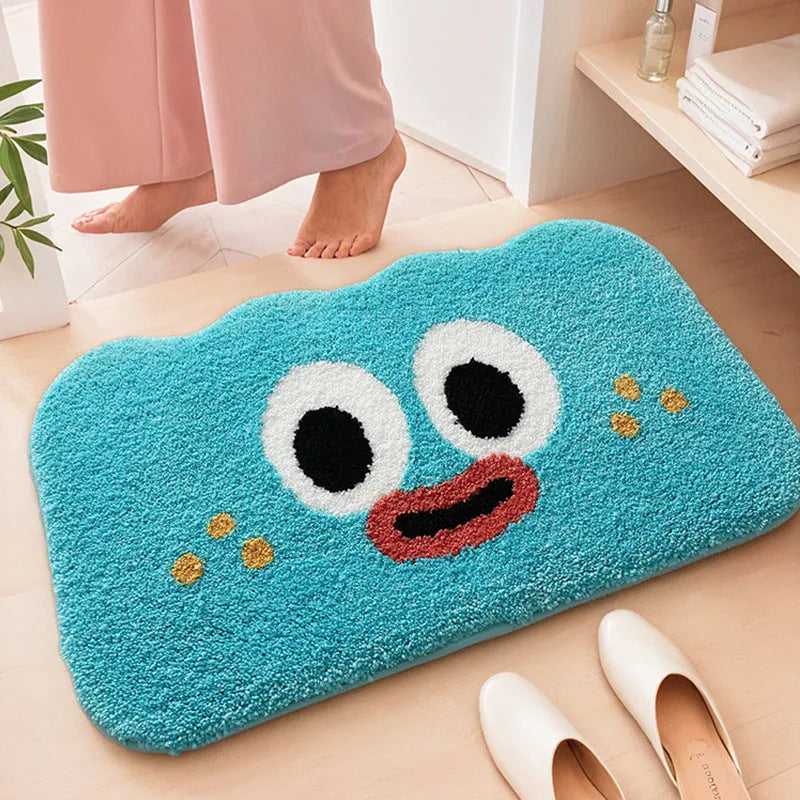 Big eye clouds cartoon patterned bathroom mat in soft green on a bathroom floor.