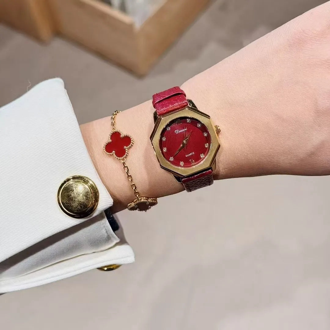 Chinese style red alloy women's wristwatch with a decorative dial on a 8mm thick case.