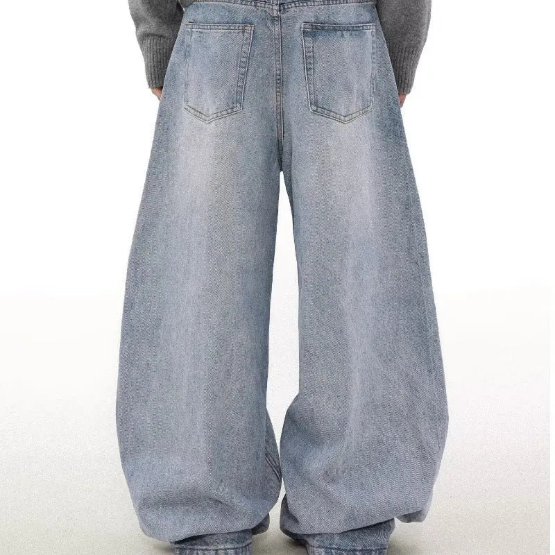 Men's blue straight leg jeans with distressed detailing and micro-elastic fabric