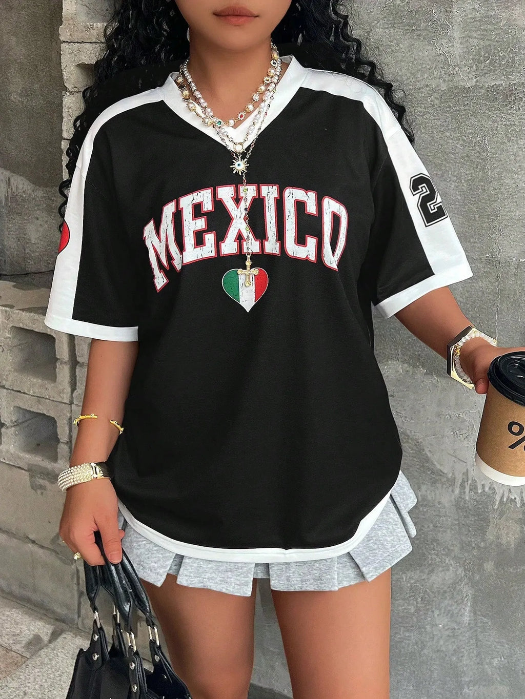 Women's loose V-neck short sleeve t-shirt with 3D letter print in various colours.