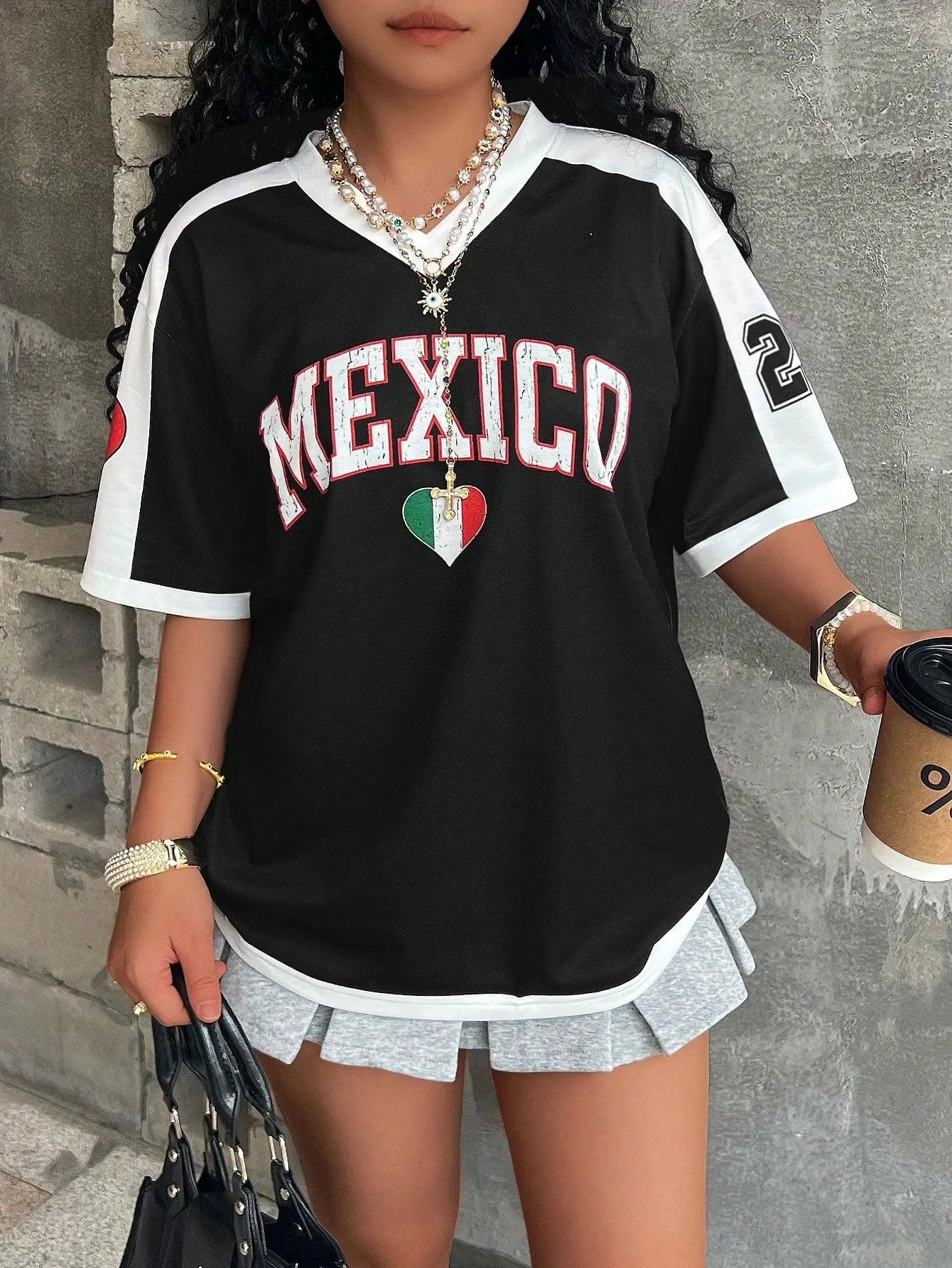 Women's loose V-neck short sleeve t-shirt with 3D letter print in various colours.