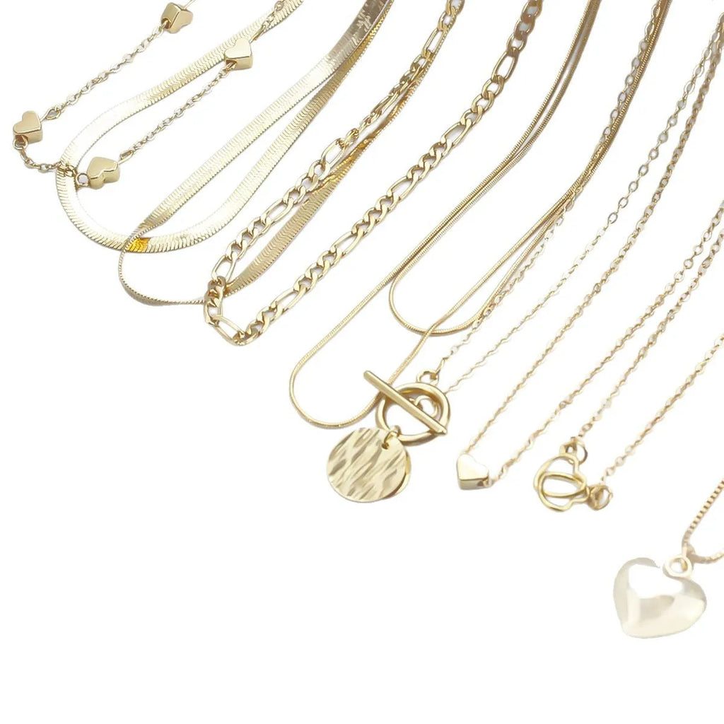 Gold women's 10-piece necklace set with alloy pendant on an adjustable snake bones chain.