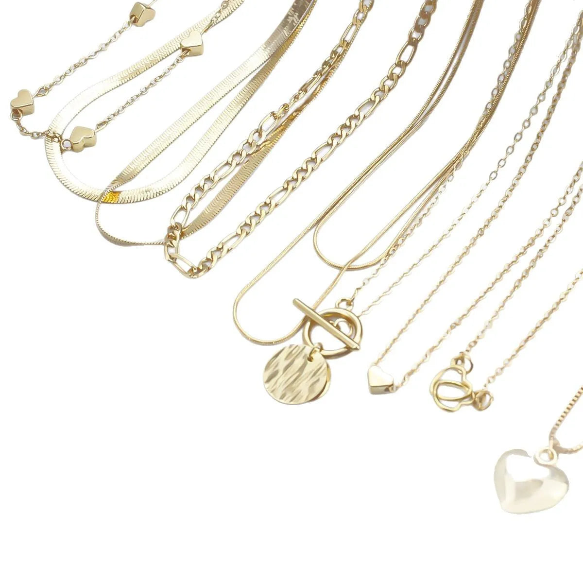 Gold women's 10-piece necklace set with alloy pendant on an adjustable snake bones chain.