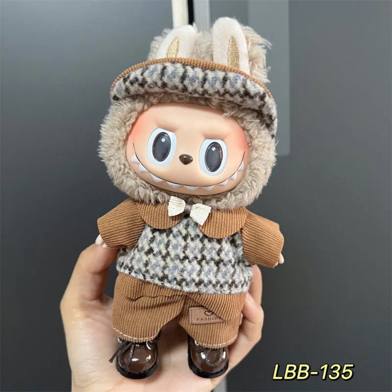 Plastic doll costume for a 17cm tall vinyl figurine on a white background.