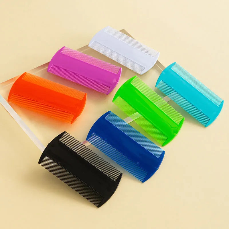 A white double-sided fine-toothed plastic comb for lice and flea detection on a plain background.