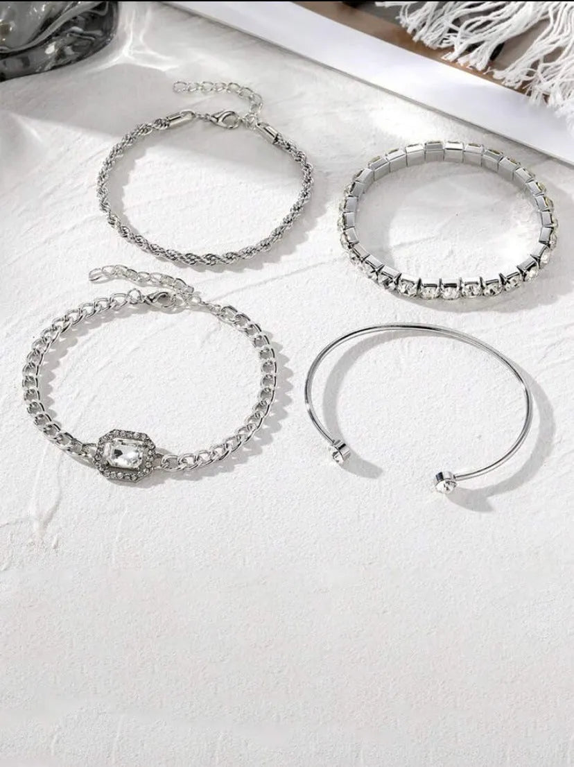 Women's retro geometric jewellery four-piece set with square diamond links in gold and silver options