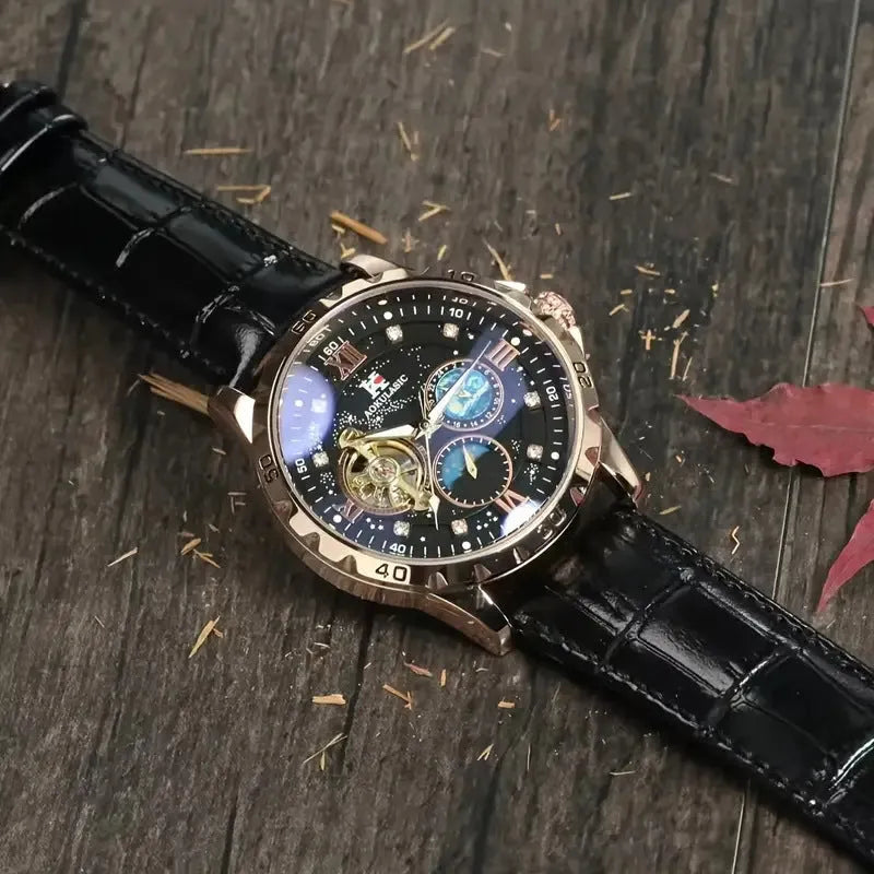 Men's automatic skeleton watch with black dial, rose gold case, and brown leather strap on wrist.