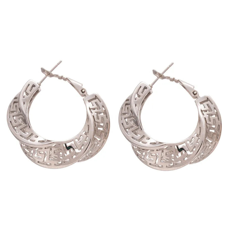 Women's geometric hollow stud earrings with twisted round design in gold and silver options