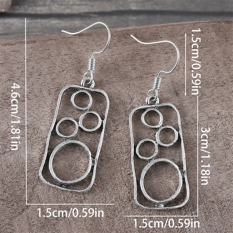 Geometric round ring earrings with irregular square design in antique silver colour