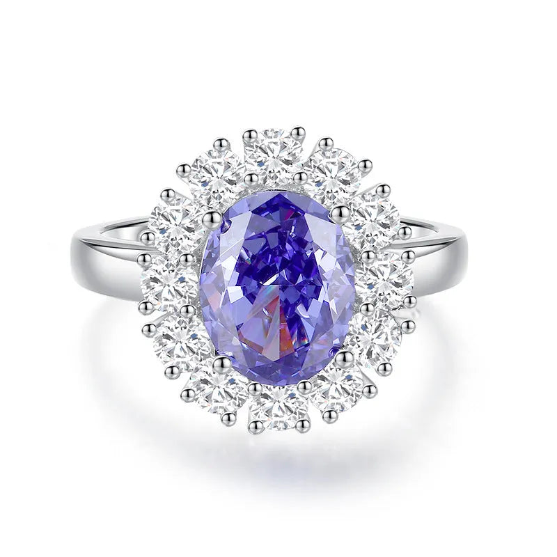 Heart-shaped sterling silver ring with a diamond ice flower cut Tan Sang colour zircon stone.