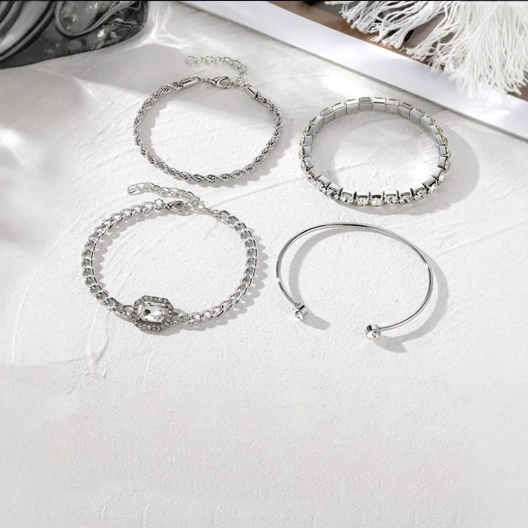 Women's retro geometric jewellery four-piece set with square diamond links in gold and silver options