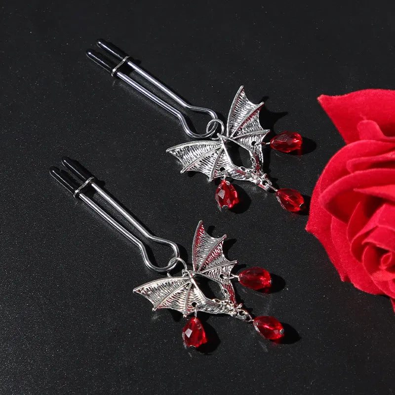 Silver bat nipple clamp with adjustable mechanism and ruby bat clip design