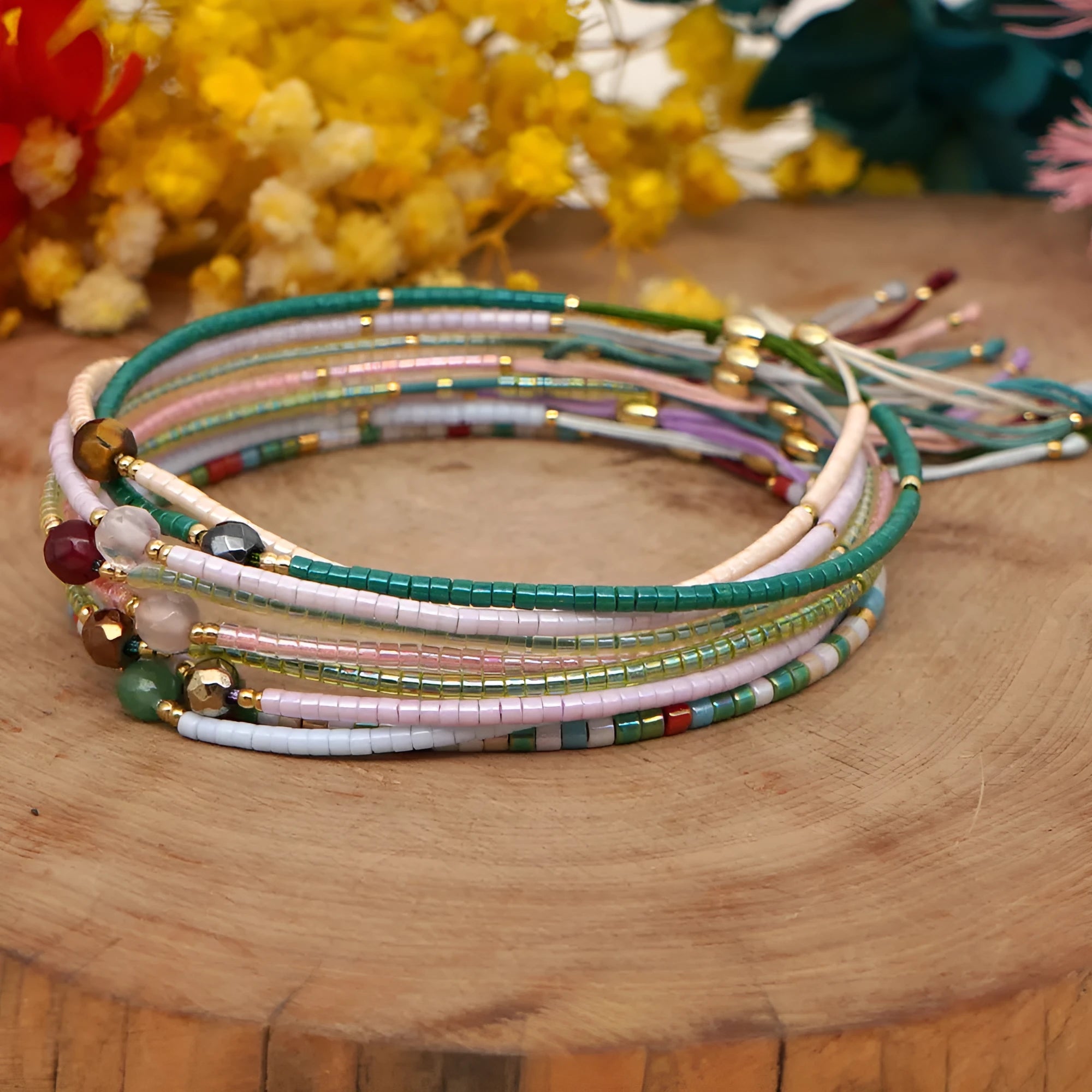 Handmade bohemian style bracelet with geometric glass and coloured glaze beads in various colours