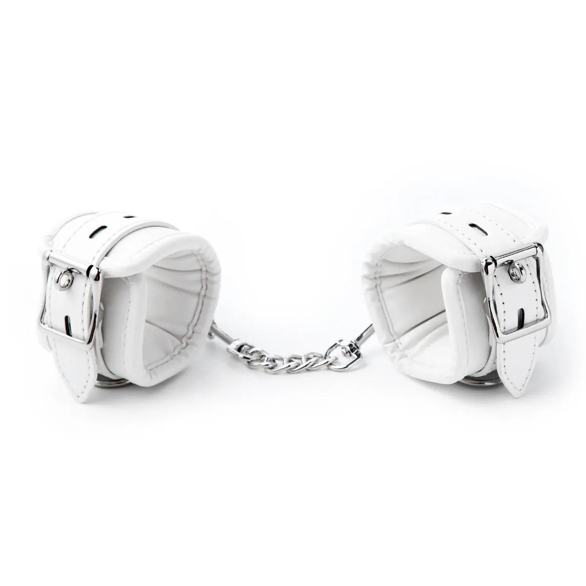 White PU sponge bondage handcuffs and foot cuffs with metal buckles on a nylon strap.