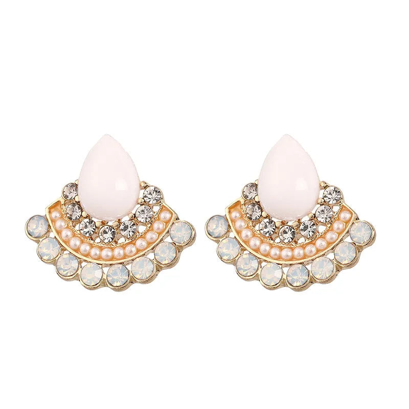 Women's retro fan-shaped silver earrings with opal rhinestone details on a geometric alloy setting.