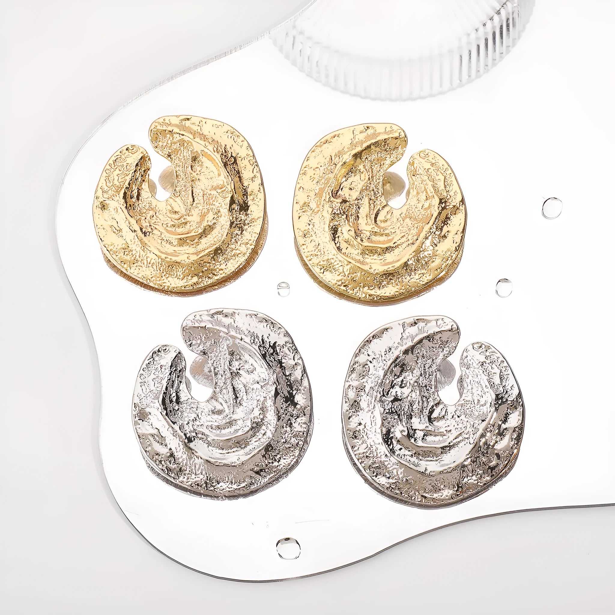 Exaggerated geometric women's earrings with irregular pleating and cold concave-convex texture in gold colour