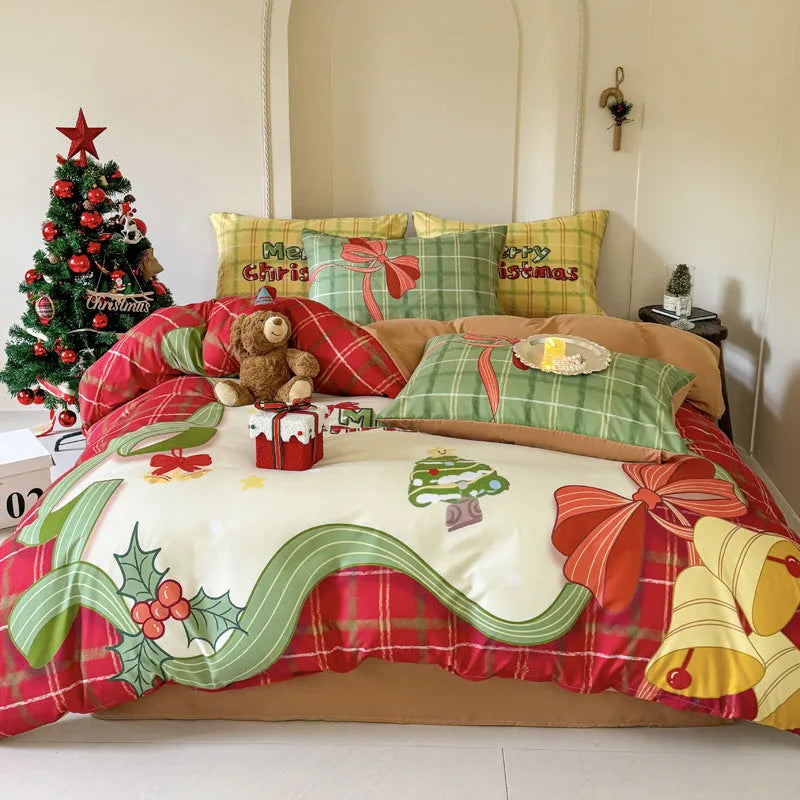 Christmas cartoon printed duvet cover and pillowcase set on a bed, showing Gingerbread Man or Tinker Bell design.