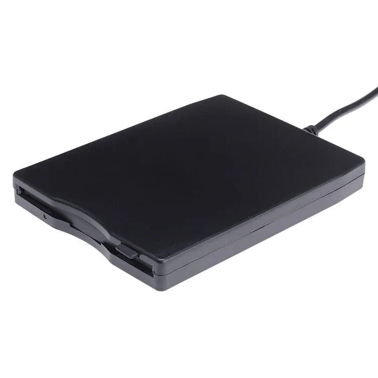 External black USB floppy drive for 35 disquete disks on a light background