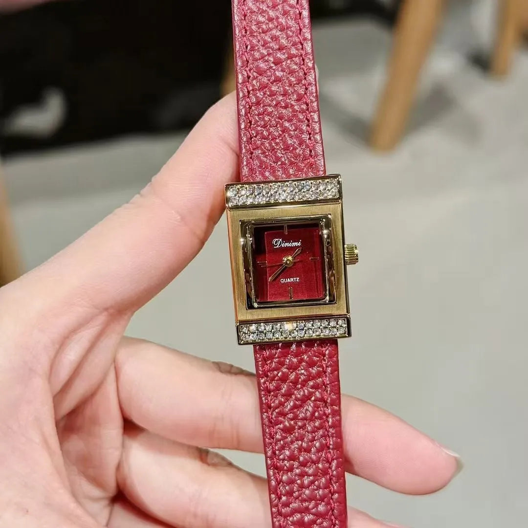 Chinese style red alloy women's wristwatch with a decorative dial on a 8mm thick case.