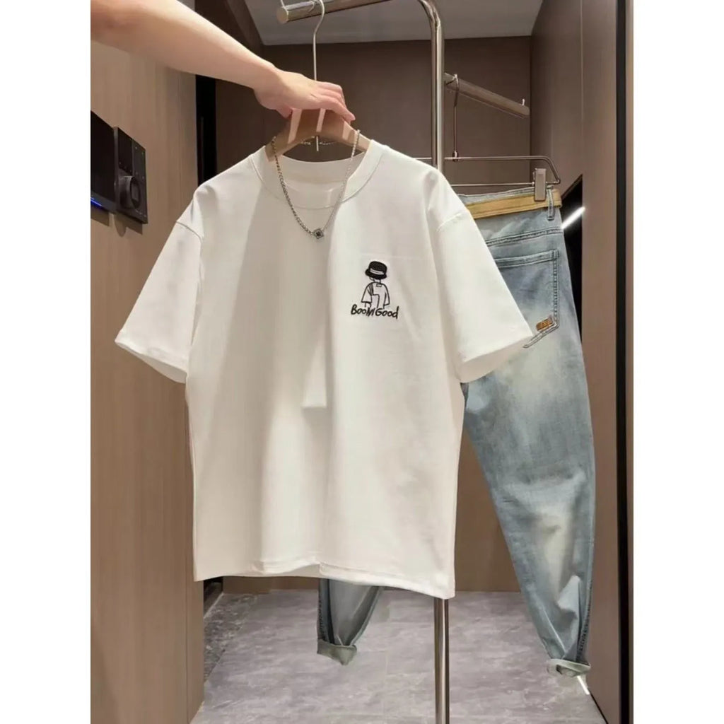 Men's white cotton T-shirt with simple cartoon print showing loose fit and short sleeves