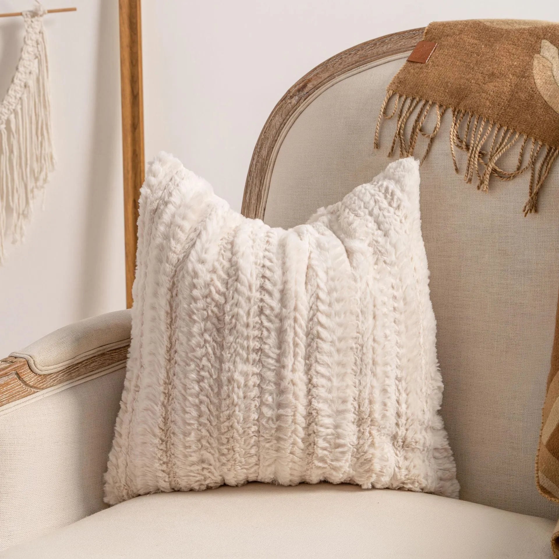 Knitted decorative cushion cover with tassel fringe in spiral dots pattern showing 45x45cm size