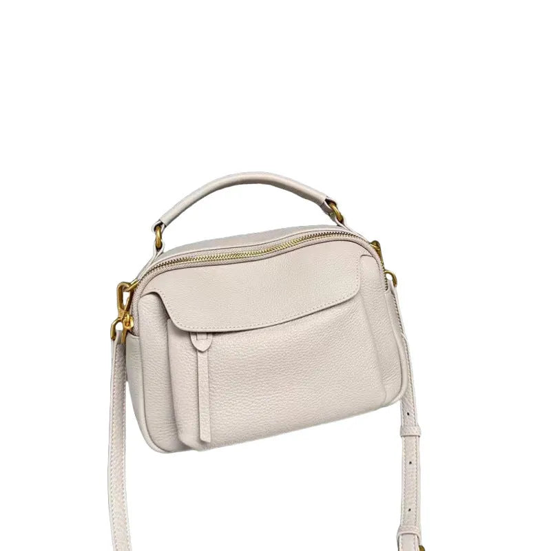 Genuine leather multi-compartment shoulder handbag in almond white with sewing thread detail and outer sandwich pocket