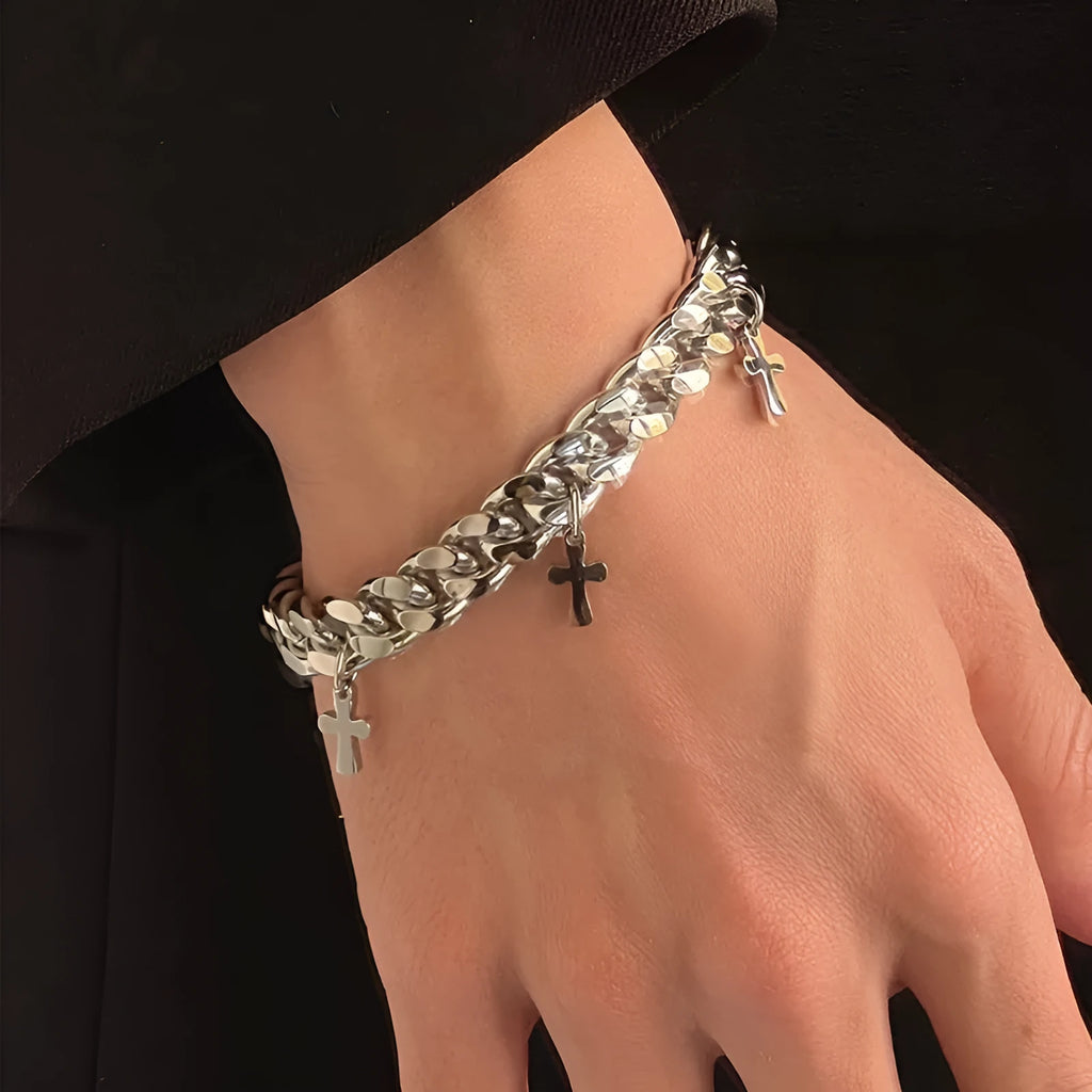 Men's titanium steel bracelet with geometric shape and cross design detail.