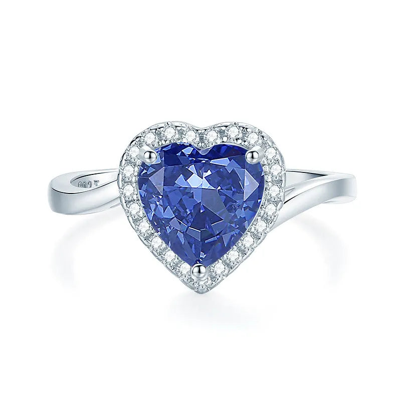 Heart-shaped sterling silver ring with a diamond ice flower cut Tan Sang colour zircon stone.