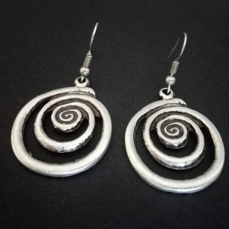 Retro geometric spiral distressed silver alloy earrings measuring 2.6cm by 5cm