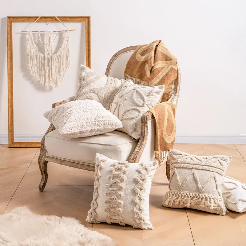 Knitted decorative cushion cover with tassel fringe in spiral dots pattern showing 45x45cm size