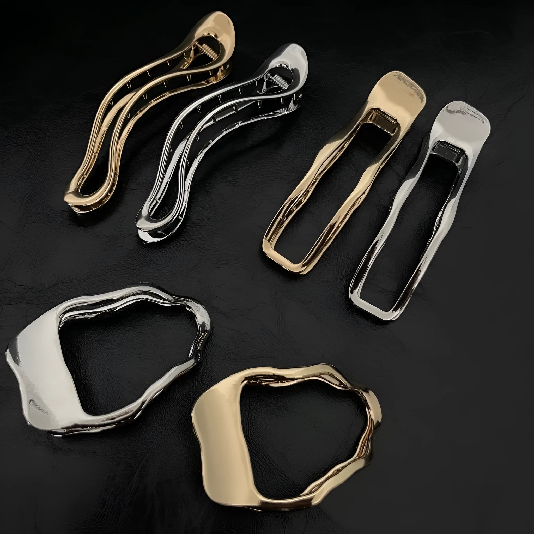 Gold and silver zinc alloy barrettes in square, arc, and triangle shapes for women.