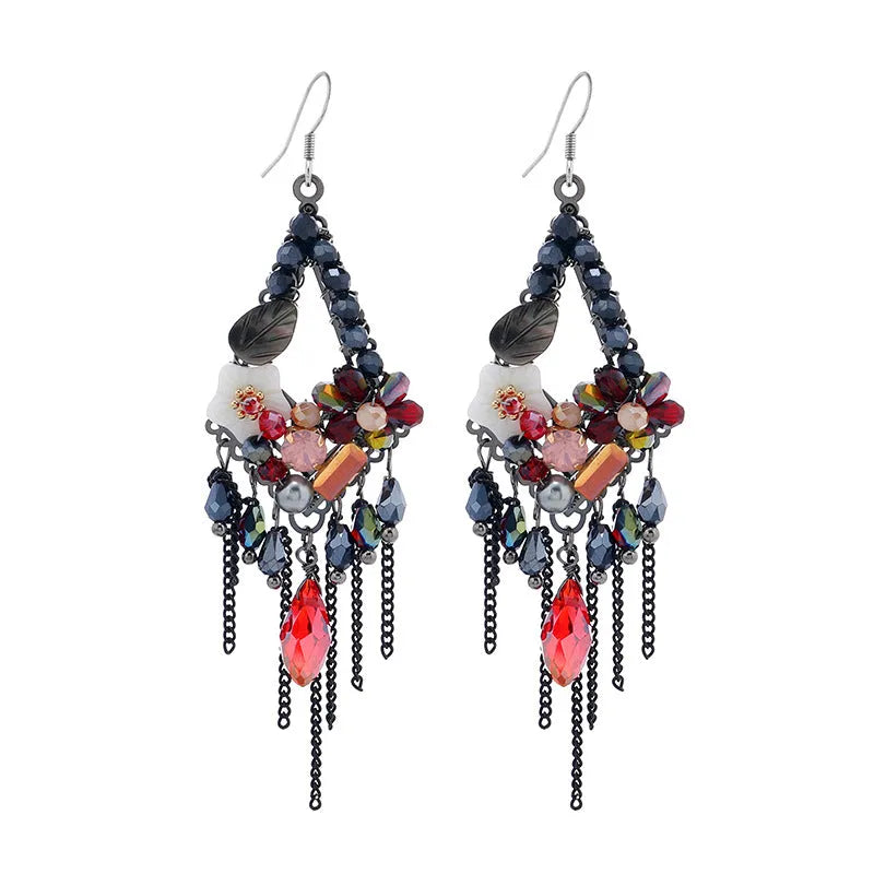 Long bohemian-style women's earrings with hand-woven artificial crystal in a diamond shape.