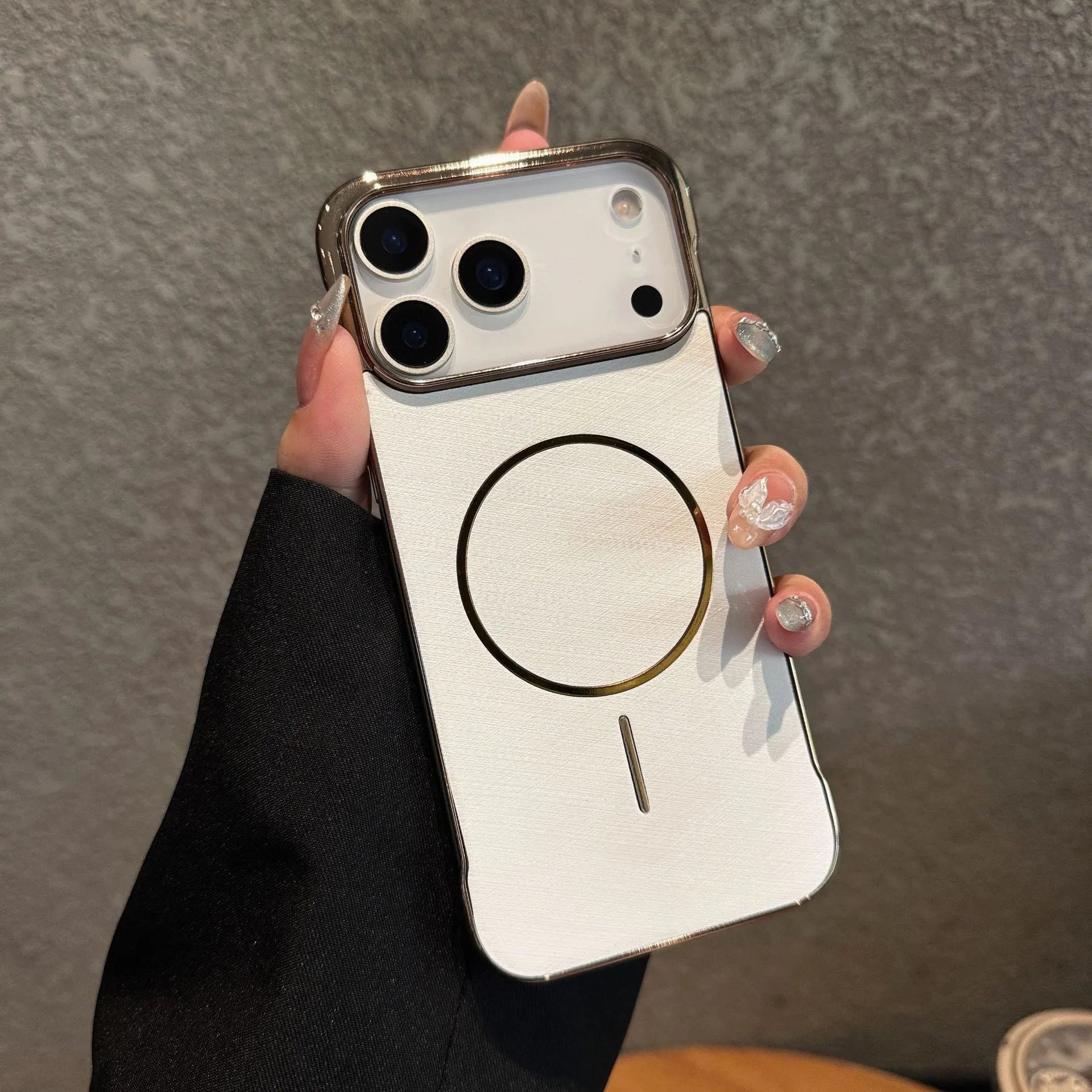 Metallic magnetic half-pack phone case for iPhone 17 in silver grey colour.