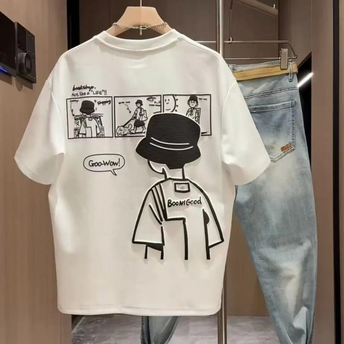 Men's white cotton T-shirt with simple cartoon print showing loose fit and short sleeves