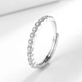 Women's geometric open mouth ring in electroplated gold colour on a plain background.