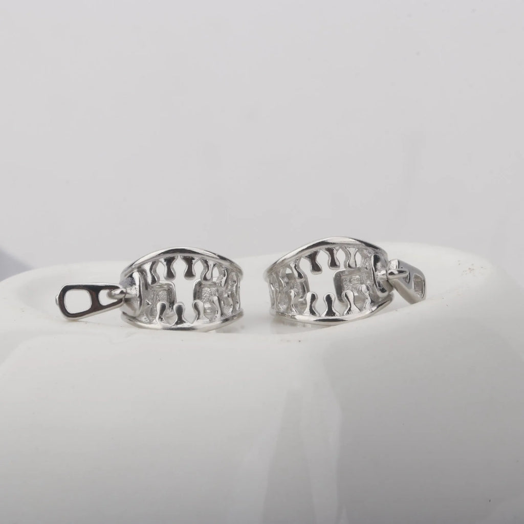 Copper geometric ear clip with line details and a zipper-style clip in colour ES862